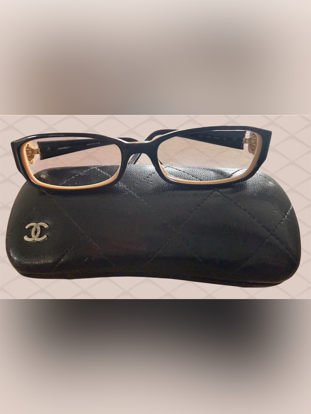 CHANEL Black Frames with Tan Inner Trim and Gold Flower with emblem on temples